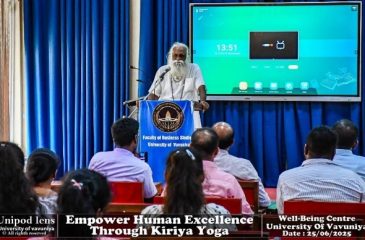 Kriya Yoga Workshop keynote session at the University of Vavuniya with Yogi Ram Sunthar addressing participants